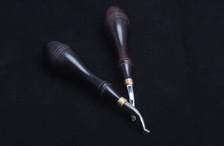 KL ebony handle creaser