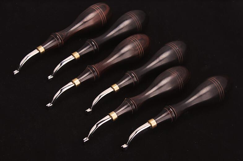 KL ebony handle creaser