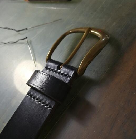 Custom made solid brass belt buckle