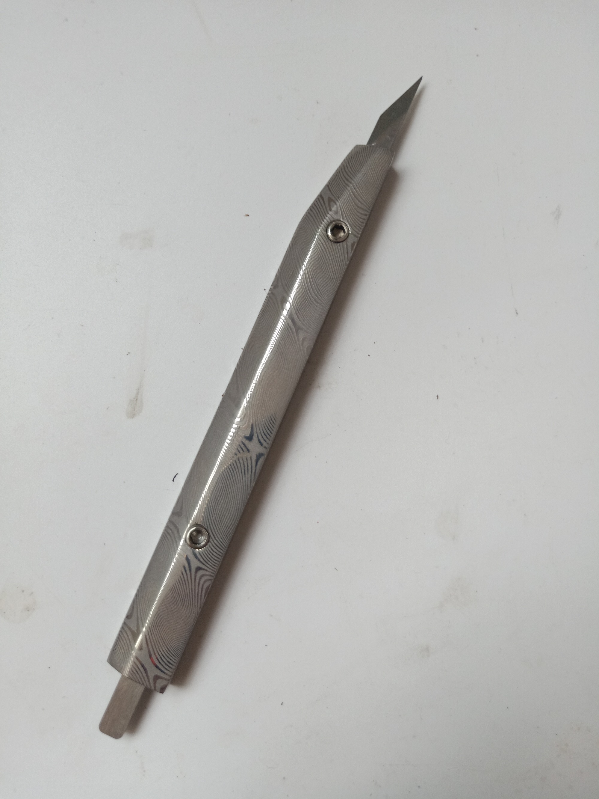 Stainless steel damascus handle clicking knife