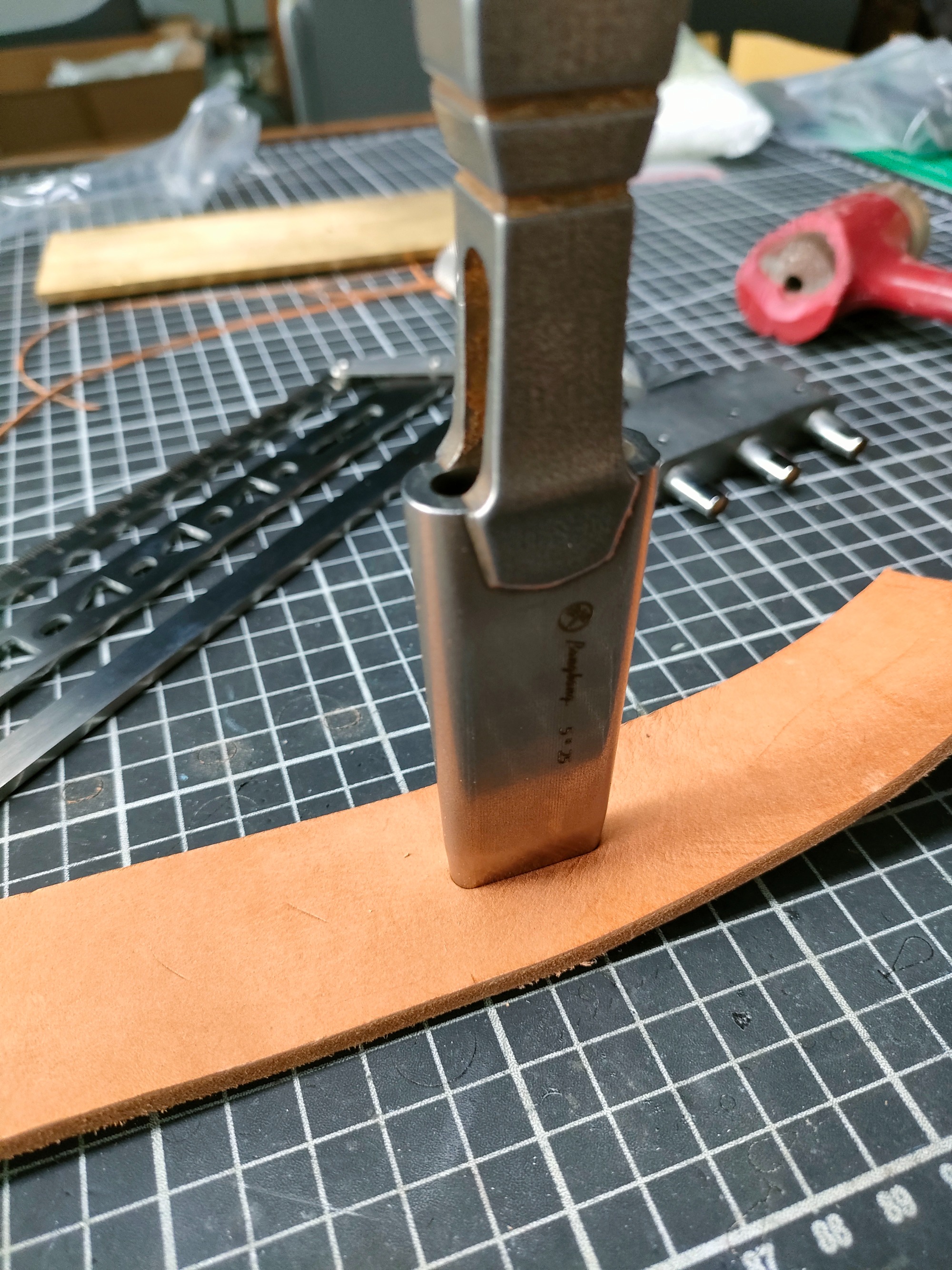 Custom oblong punches (sword handle)